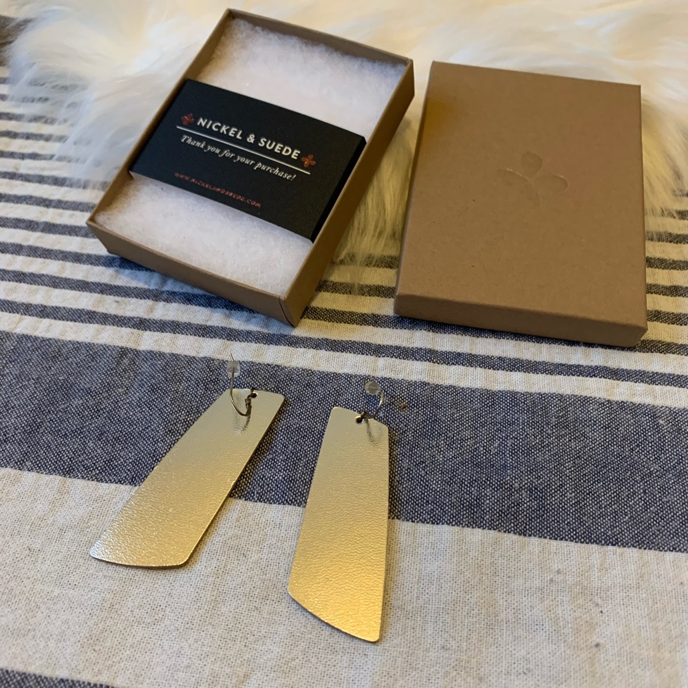 Silver leather asymmetrical earrings
